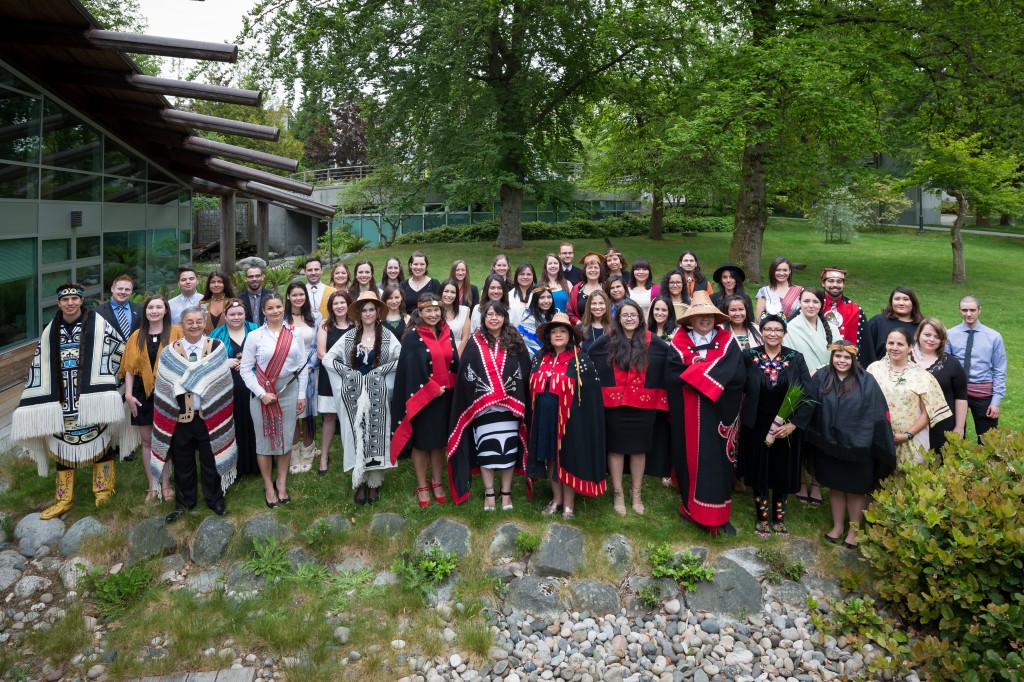 Aboriginal graduates gather at the UBC First Nations Longhouse for the First Nations House of Learning Graduation Celebration Photo Credit: Don Erhardt